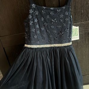 Navy blue formal dress never worn. Size 14